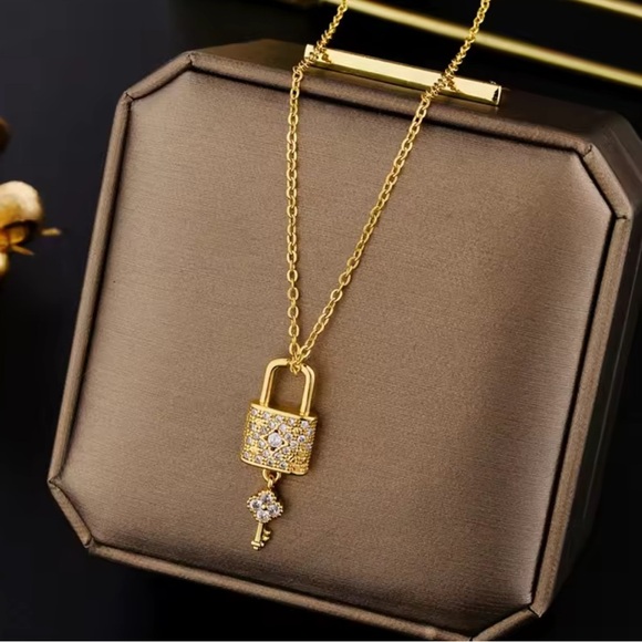 Anthropologie Jewelry - Golden Key Lock Crystal Necklace